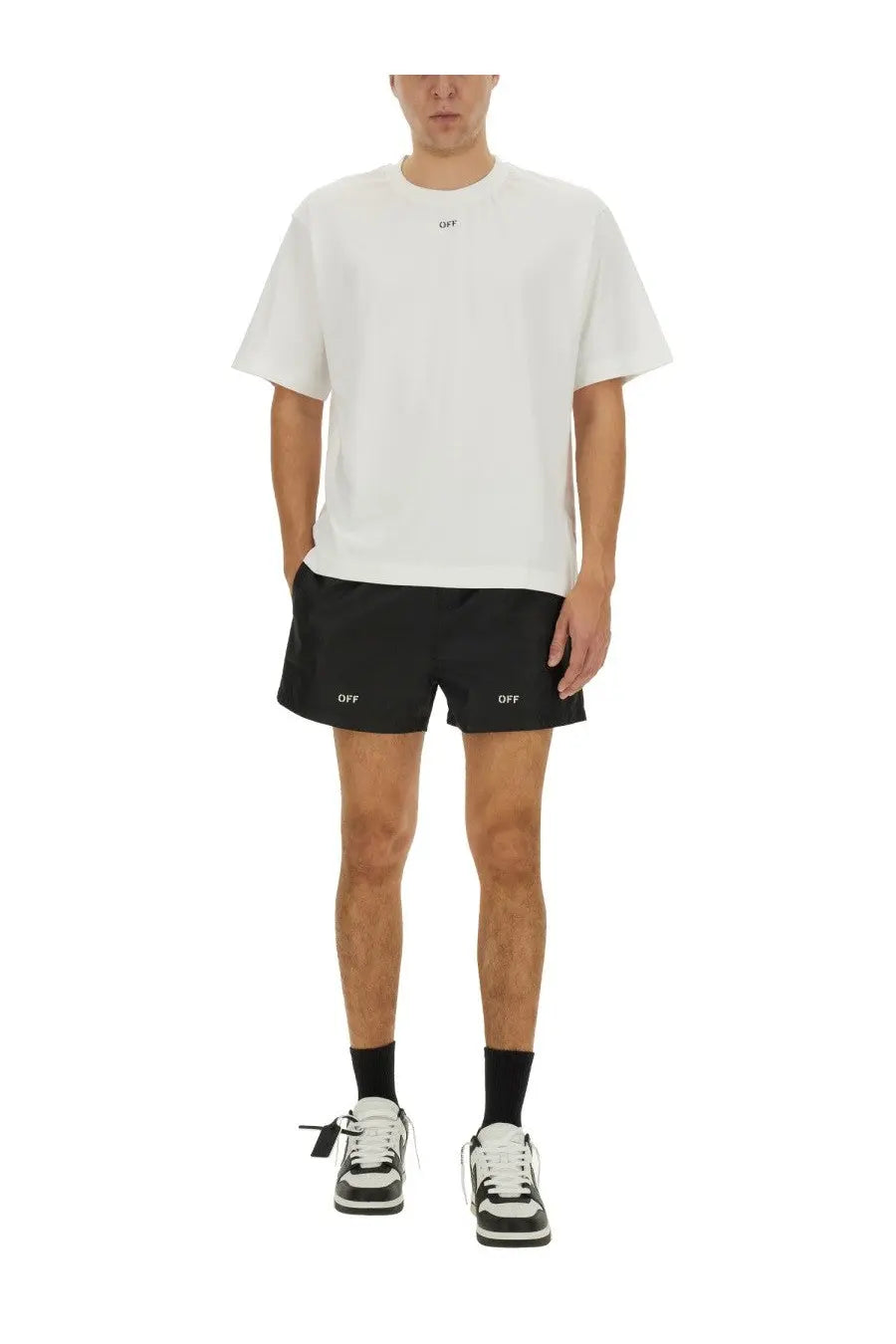 Off-white men’s boxer swimsuit black with subtle off branding on white t-shirt and black shorts with repeated logos