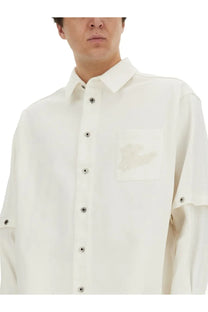 Off-white men’s jacket shirt white with a crisp button-down style, subtle chest patch, and adjustable sleeve cuffs