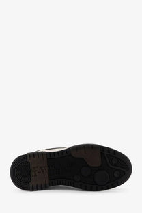 Black rubber sole with embossed off-white branding and circular tread patterns on off-white men’s out of office leather sneakers black