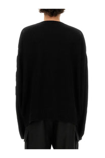 Off-white men’s oversize shirt black featuring a black oversized knit sweater with ribbed cuffs and hem