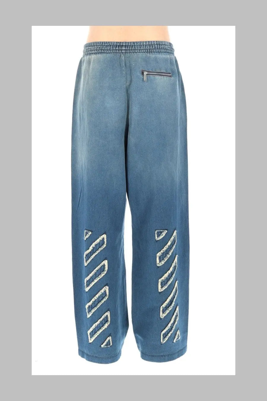 Off-white men’s blue denim joggers with white diagonal stripe embroidery on lower legs for casual wear