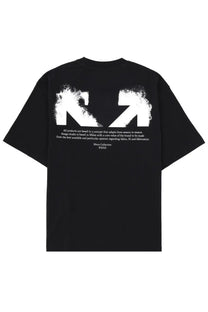 Black oversized off-white men’s shirt showing the back with a bold white spray-painted logo and text design