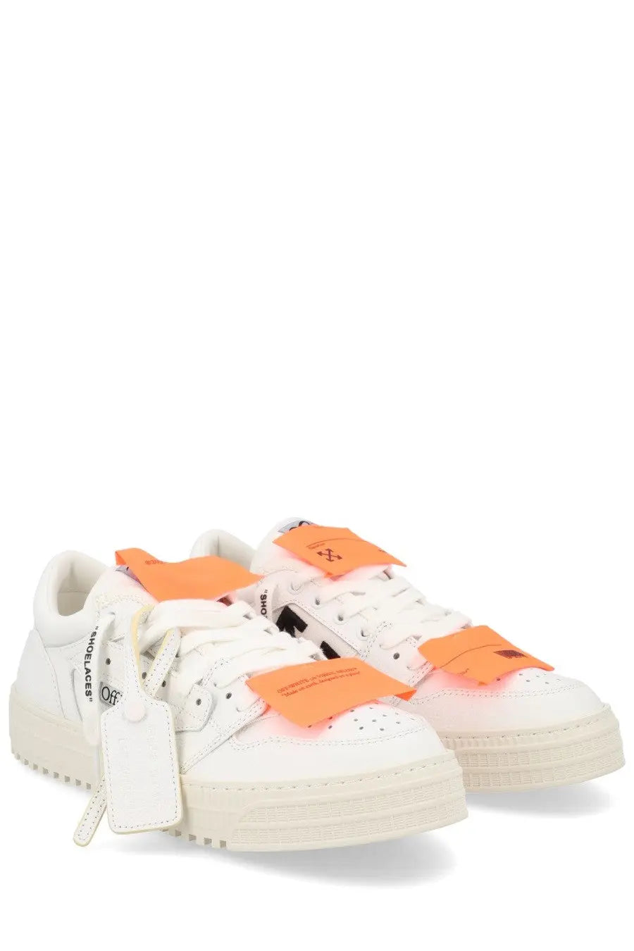 Off-White men’s low top court sneaker in white with vibrant orange fabric patches and a chunky sole
