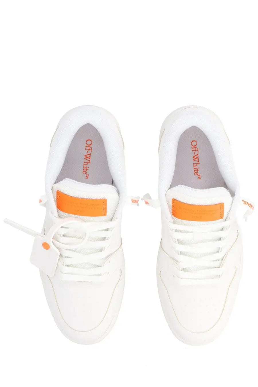 Off-white men’s sneaker out of office with minimalist design and orange accents on white leather upper