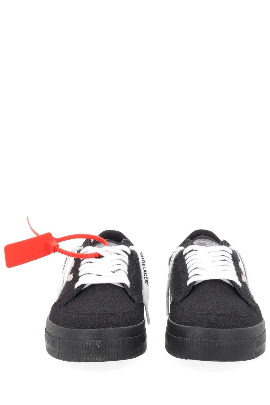 Off-White men’s sneaker vulc low black canvas sneakers with white laces and a bold red tag on the left shoe