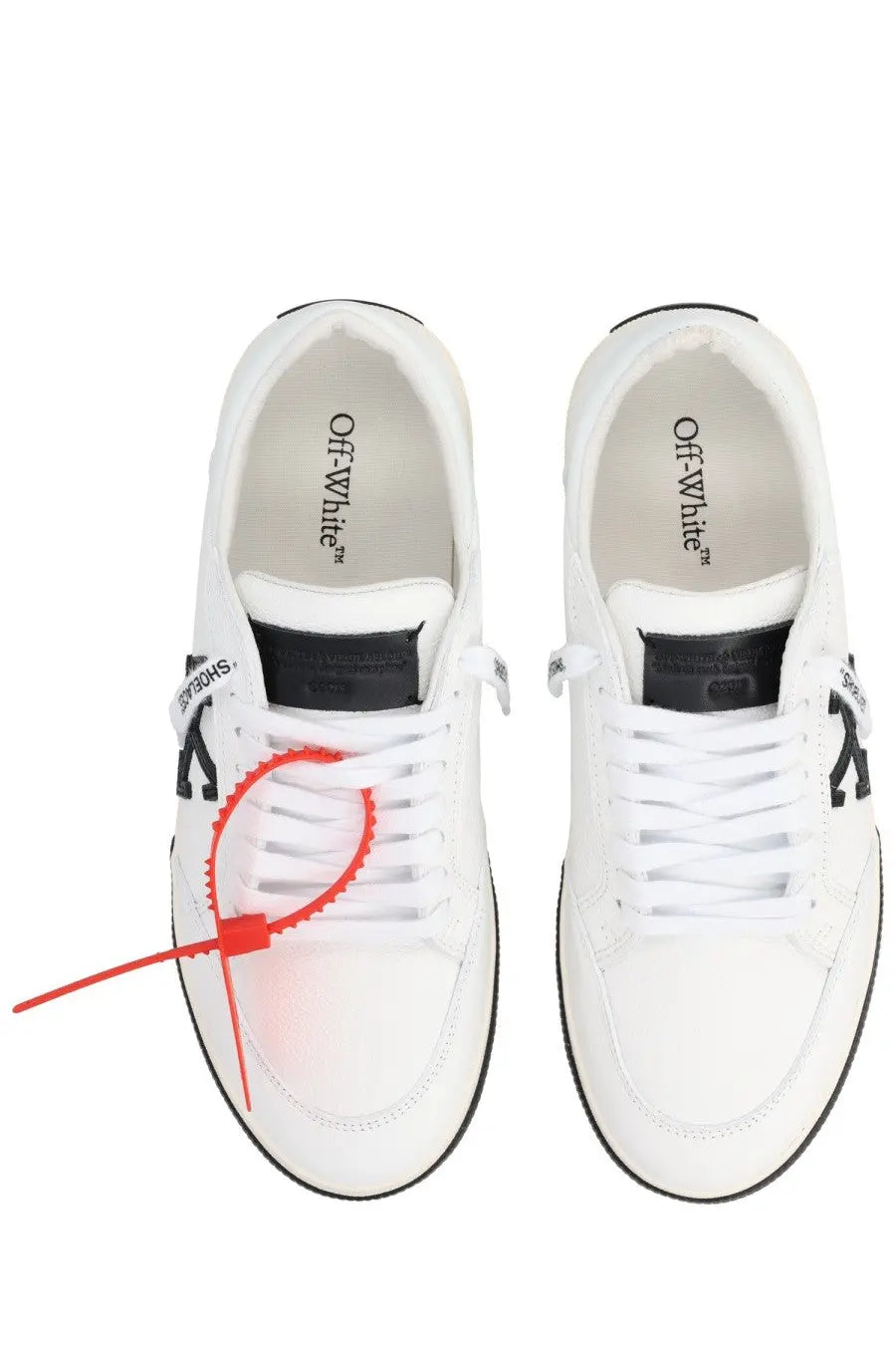 Off-white men’s sneaker vulc low white white leather sneakers with black accents and red zip tie threaded through laces