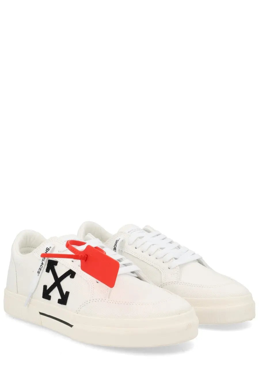 Off-white men’s sneaker vulc low white leather sneakers with bold black logo and bright red tag for casual wear