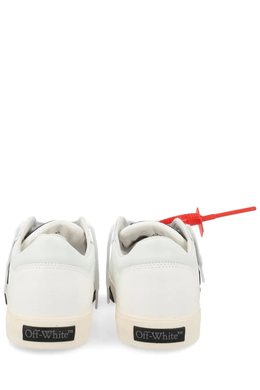 Off-White men’s sneaker vulc low white white leather with red plastic heel tag and black off-white branding on sole back view