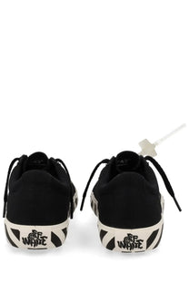 Off-white men’s sneaker vulc undercut black showing back with black canvas, white rubber soles, and diagonal stripes