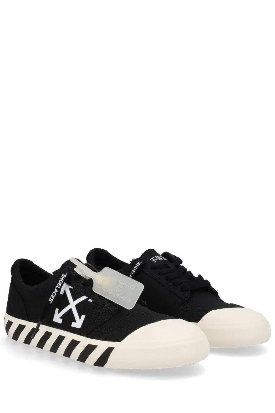 Off-white men’s sneaker vulc undercut black with white rubber toe caps and black and white striped soles featuring arrow logo