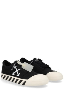Off-white men’s sneaker vulc undercut black with white rubber toe caps and black and white striped soles featuring arrow logo