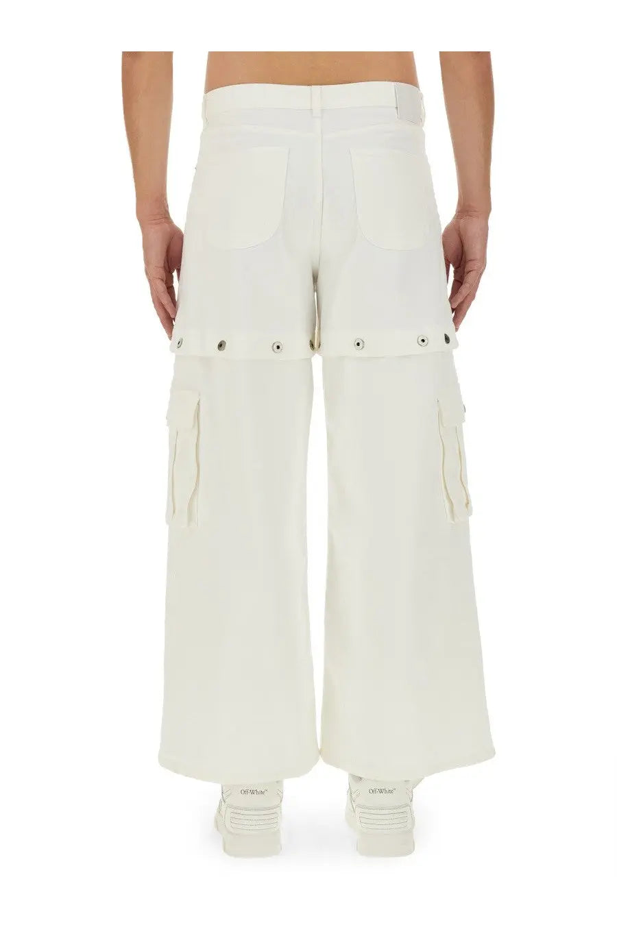 Off-white men’s super baggy jeans in creamy white denim with wide legs and multiple pockets with silver button accents