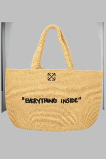 Yellow woven straw tote bag with black embroidered off-white logo and phrase everything inside on front panel
