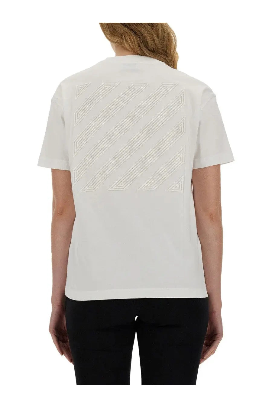Off-white women’s white short-sleeved t-shirt showing the back with subtle geometric embroidery on cotton fabric