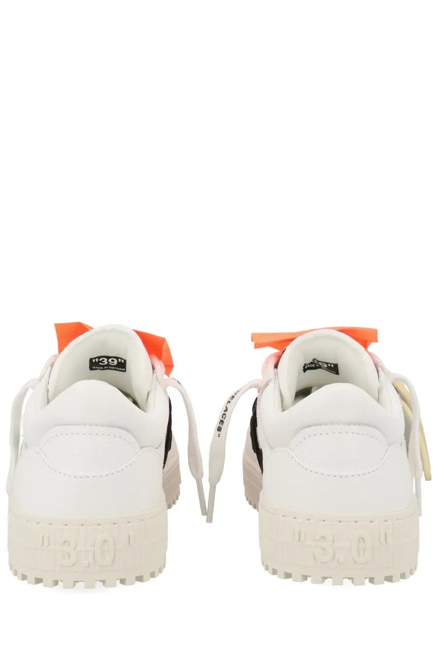 Off-white women’s low top court sneaker in white with orange laces and black accents for casual wear