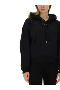 Off-white women’s black oversized hoodie with white embroidered logo and silver-toned drawstring tips