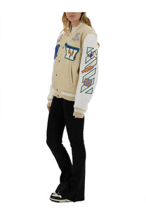 Off-White women’s beige varsity jacket with white accents featuring colorful embroidered patches and geometric designs