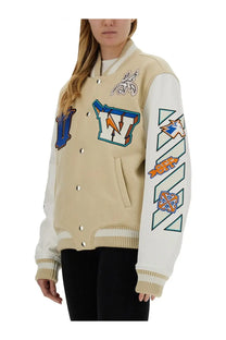 Off-White women’s beige varsity jacket with white sleeves and colorful embroidered patches featuring a blue W logo on chest