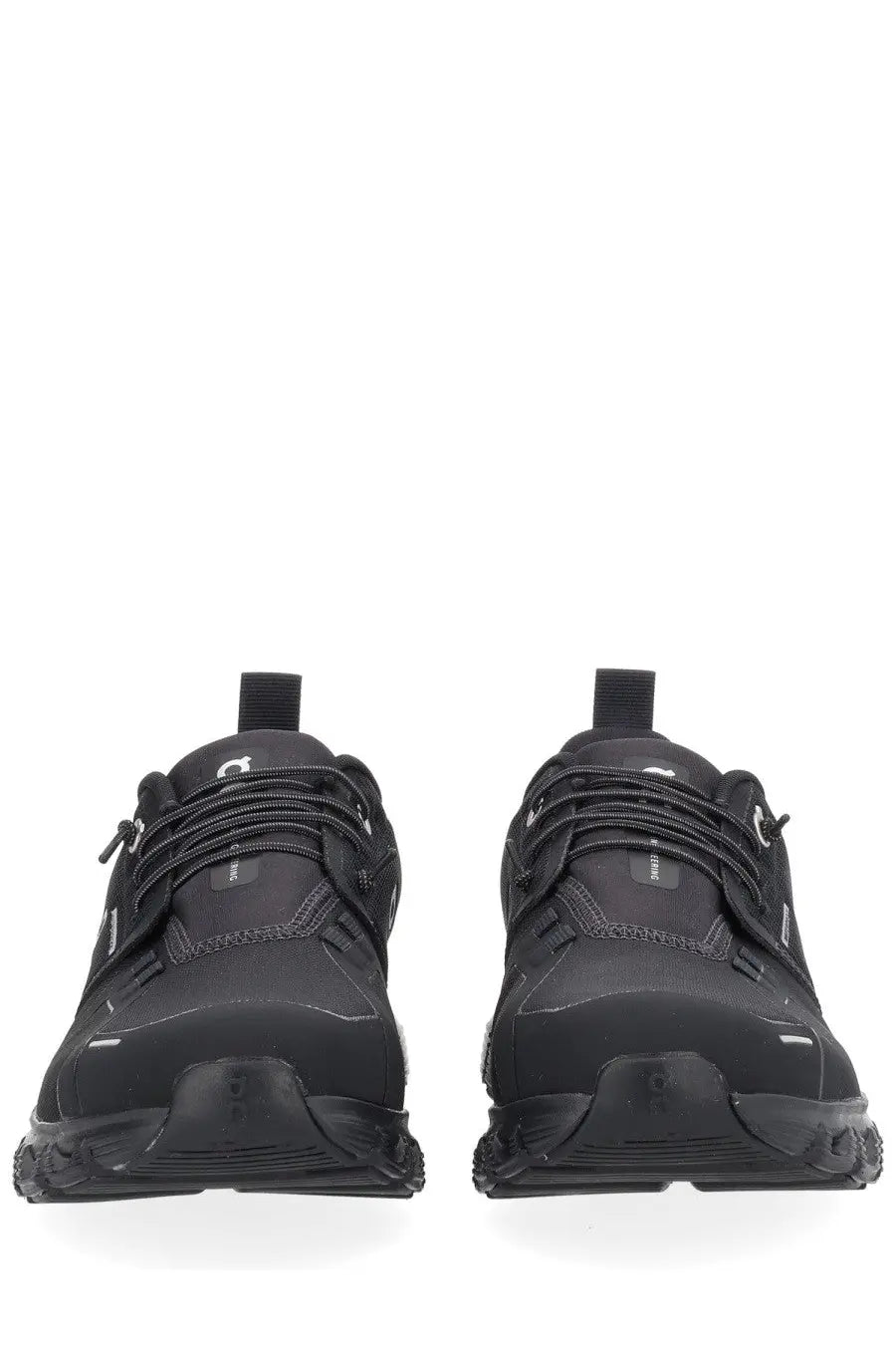 On women’s cloud sneaker black trail running shoes with sleek modern design and textured rubber soles