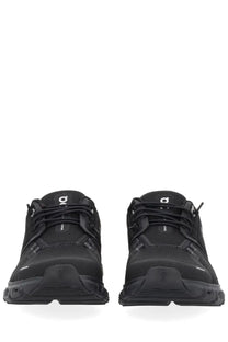 On women’s cloud sneaker black trail running shoes with sleek textured upper and rugged outsole for outdoor use