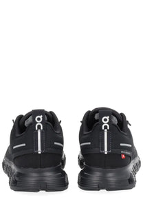On women’s cloud sneaker black featuring black running shoes with white logo accents and textured rubber sole