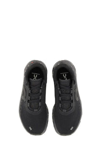 On women’s cloudmonster sneaker black with mesh upper and rubber sole designed for running and comfort