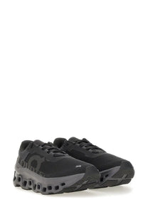 On women’s cloudmonster sneaker black with chunky sole design and subtle gray accents on the midsole