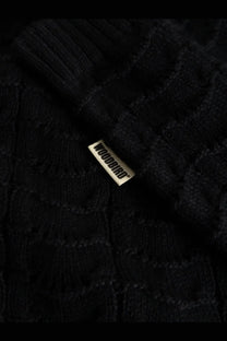 Black knitted cotton sweater with ribbed texture and metallic woodbird brand tag for men