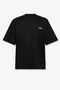 Black oversized crewneck t-shirt with small white woodbird logo on left chest made from organic cotton