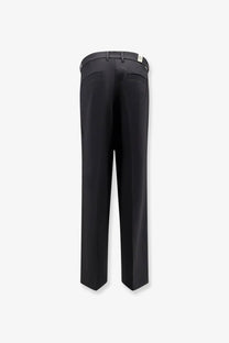 Black tailored woodbird men’s viscose blend trousers with sleek straight-leg cut and subtle back pleats shown from back