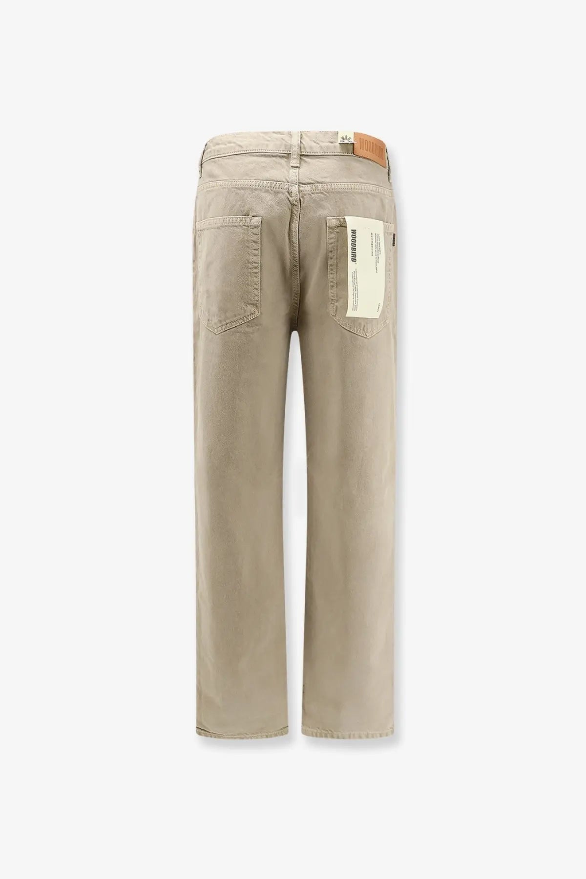 Beige straight-leg denim trousers with brown leather waistband label and white paper tag on back pocket woodbird men’s wbleroy base