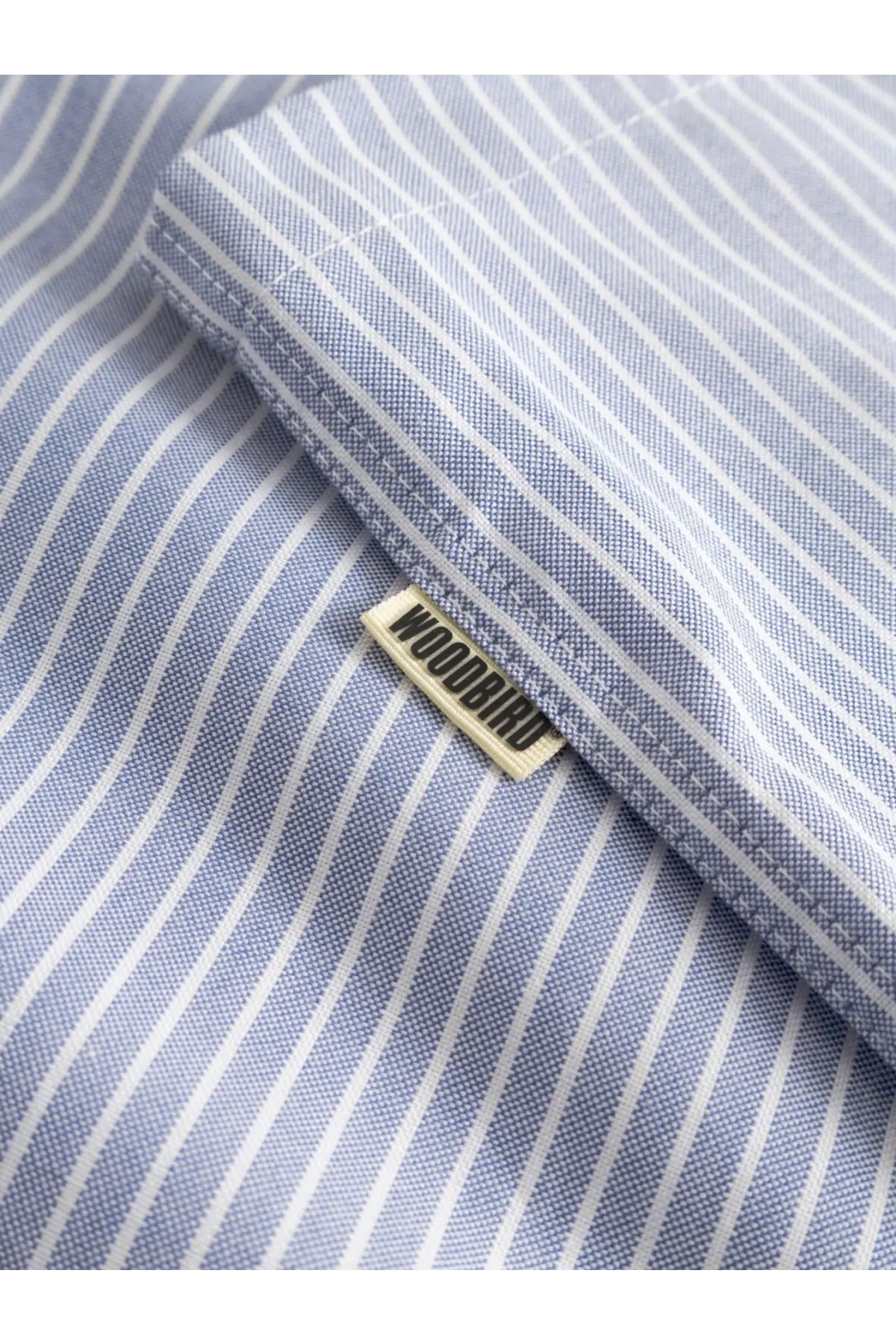 Woodbird men’s wbwang ox flower striped cotton shirt in blue with light blue and white vertical stripes and beige collar label