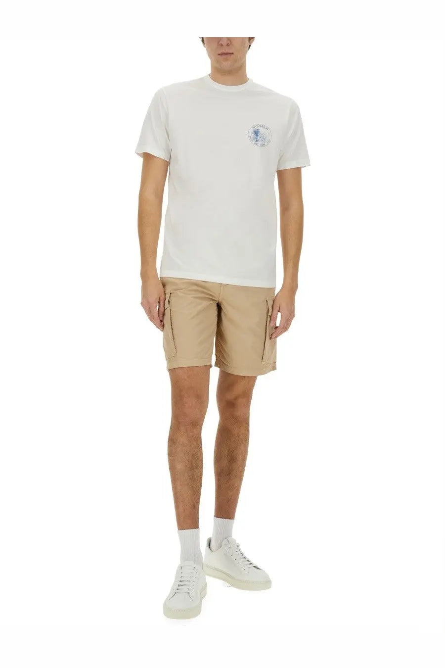 White cotton t-shirt with small embroidered logo on left chest paired with woolrich men’s beige cargo shorts