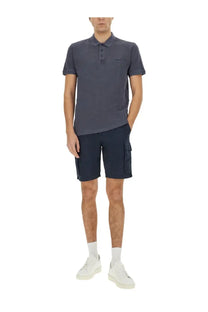 Dark gray short-sleeved polo shirt with subtle logo paired with woolrich men’s blue cargo shorts
