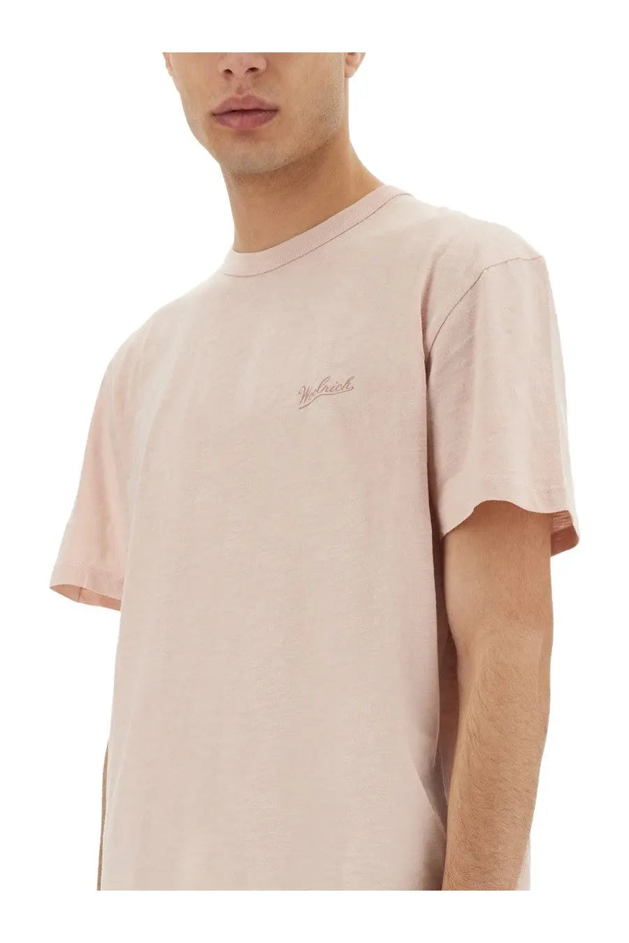 A woolrich men’s flamed cotton shirt blue featuring a soft blush pink short-sleeved crew neck with embroidered logo