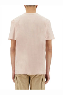 A soft blush pink cotton t-shirt with a crew neck and short sleeves for casual wear