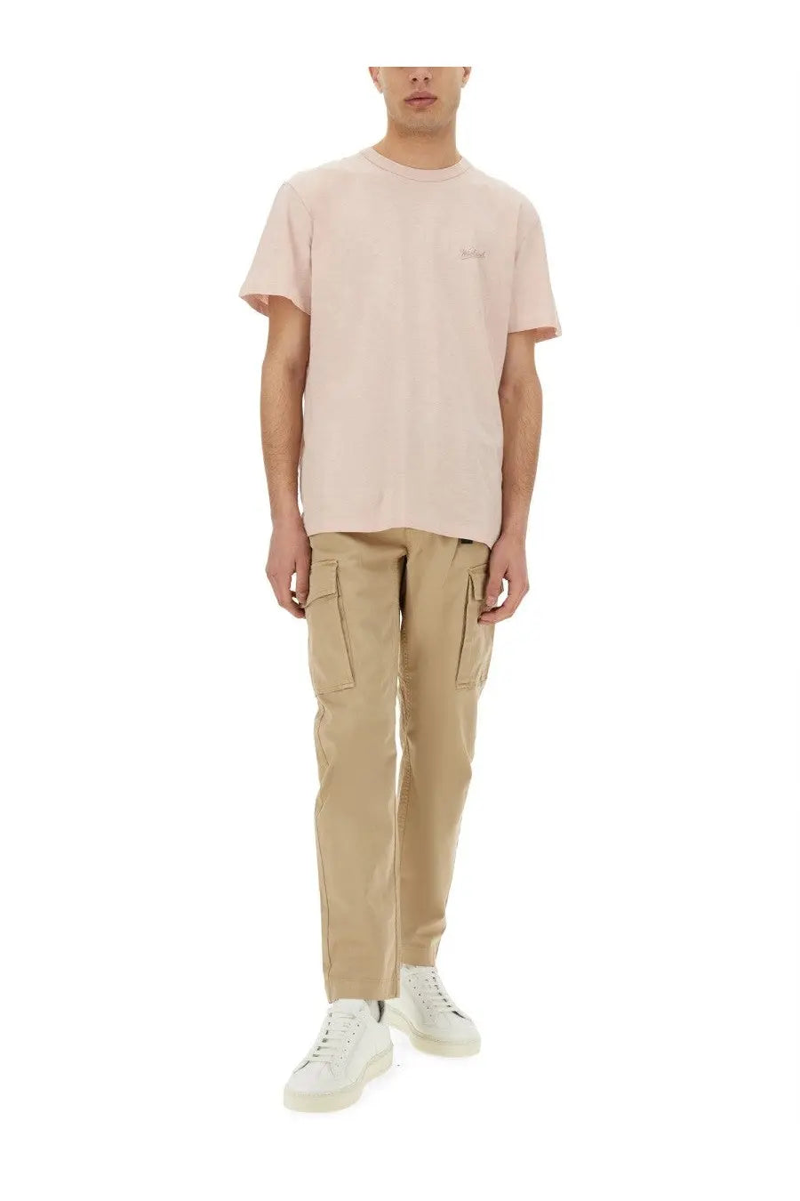 A soft pink short-sleeved crew neck t-shirt with subtle embroidery on the left chest for casual wear