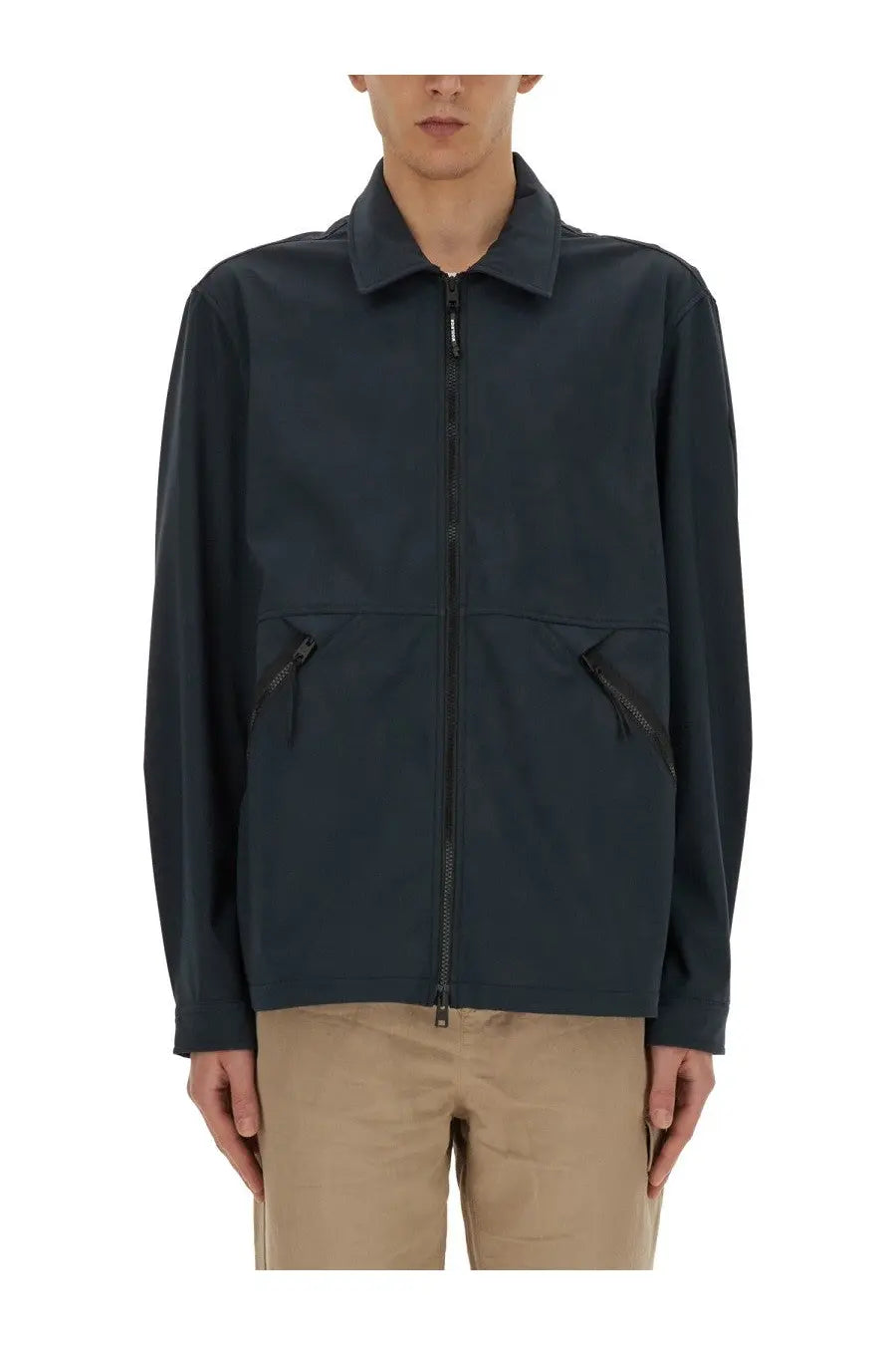 Woolrich men’s dark navy wool zip-up jacket with collar and two front pockets featuring black zippers