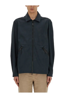 Woolrich men’s dark navy wool zip-up jacket with collar and two front pockets featuring black zippers