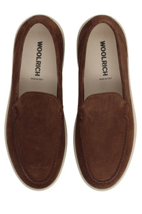 Woolrich men’s mocassino brown suede loafers with white rubber sole and Woolrich branding on the insole