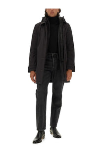 Woolrich men’s black nylon jacket with a sleek hooded trench coat design and subtle button detailing