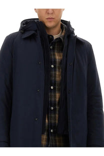 Woolrich men’s nylon jacket blue with dark navy hooded coat featuring quilted interior and black buttons