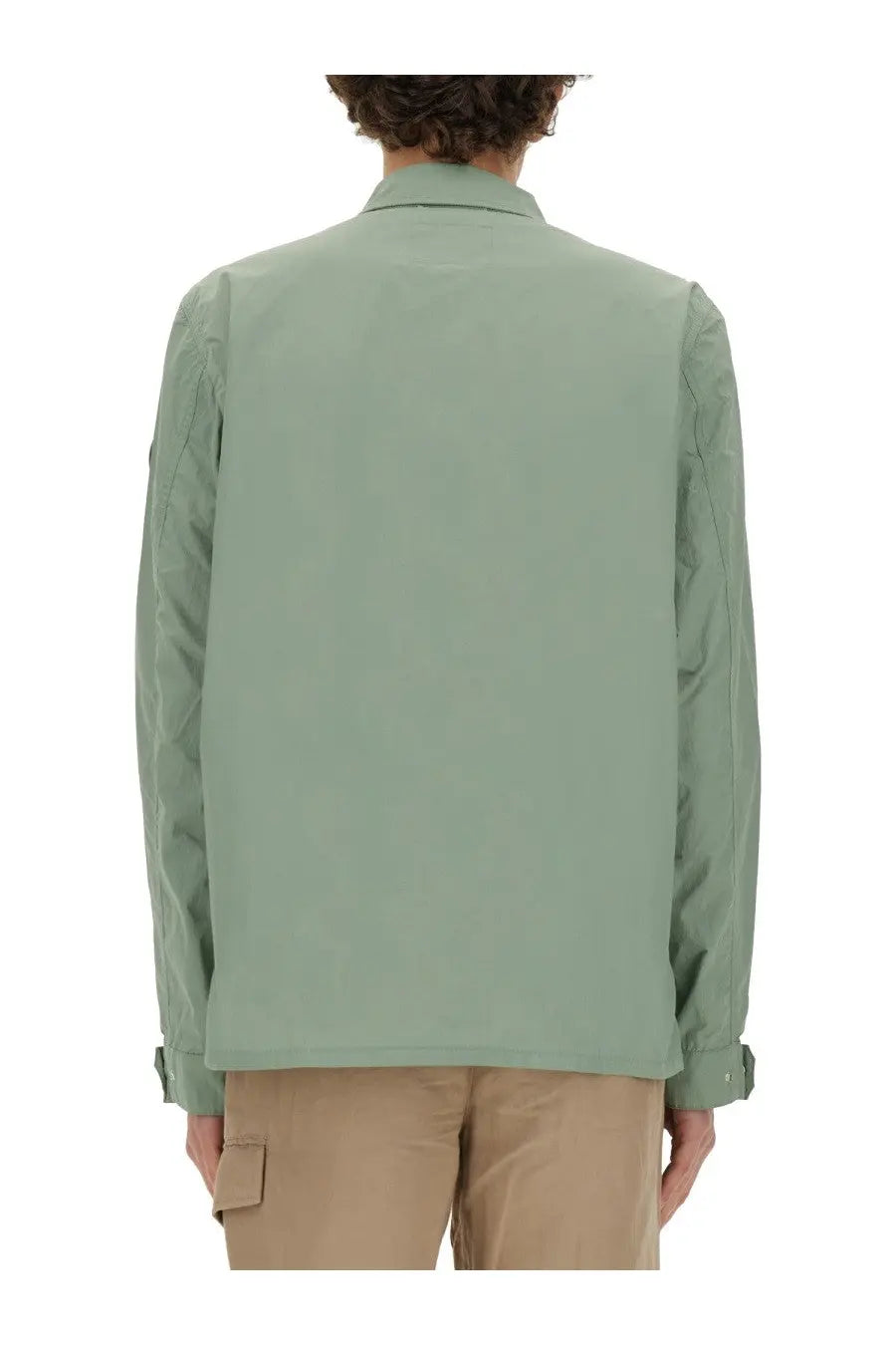 Woolrich men’s nylon shirt in green featuring a sleek sage green utility jacket style with structured collar and seam detailing