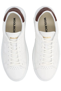 Woolrich men’s sneaker arrow white white leather sneakers with brown heel accents and gold-tone branding