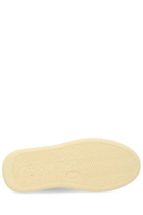 Cream-colored rubber sole with subtle textured pattern and embossed branding on woolrich women’s pelle beige sneaker