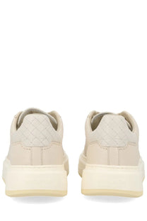 Cream-colored Woolrich women’s leather sneakers with quilted diamond heel and chunky off-white rubber sole back view