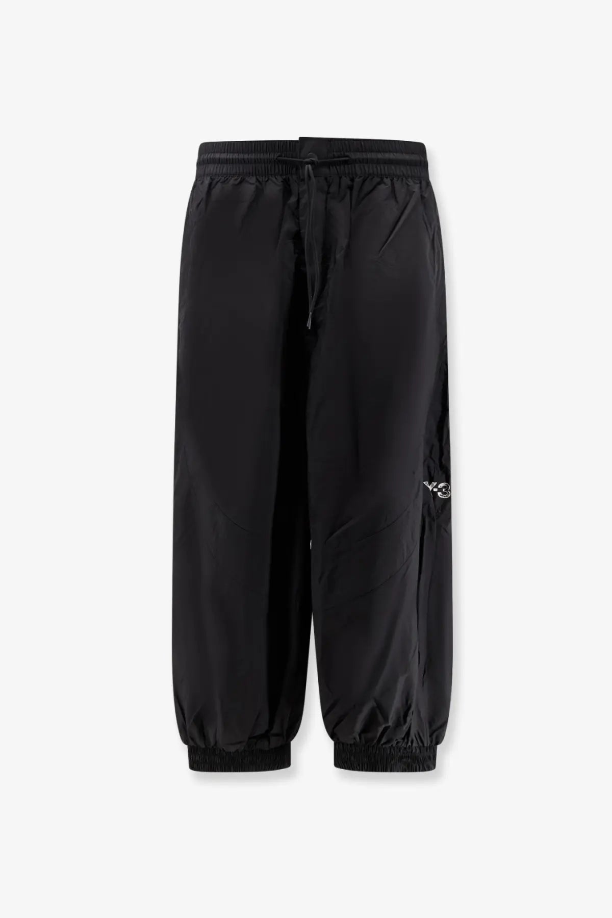 Y-3 men’s baggy black nylon track pants with drawstring waist and elastic cuffs for comfortable wear
