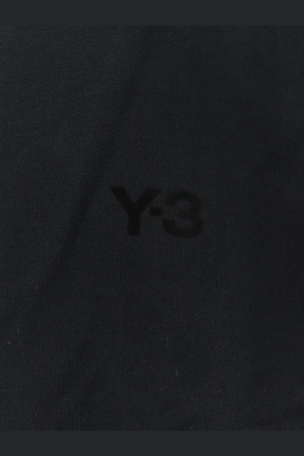 Black y-3 logo embroidered on dark fabric of y-3 men’s cotton blend sweatshirt black