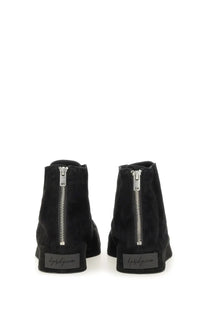 Black suede y-3 men’s nizzastar hi sneaker ankle boots with silver zippers and branded label on the heel back side