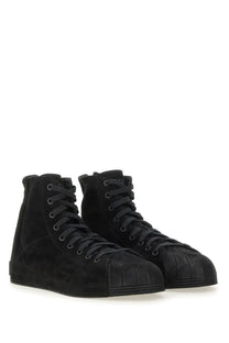 Y-3 men’s Nizzastar HI sneaker in black suede with high-top minimalist design and matching laces